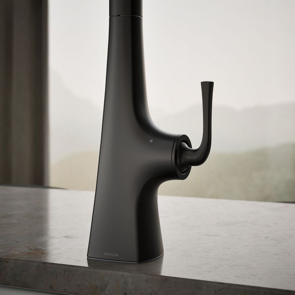 Graze Touchless pull-down kitchen sink faucet with three-function sprayhead, close-up of feature in use, K-22068-BL