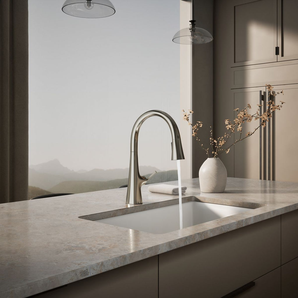 Graze Touchless pull-down kitchen sink faucet with three-function sprayhead, in use in a room setting, K-22068-SN