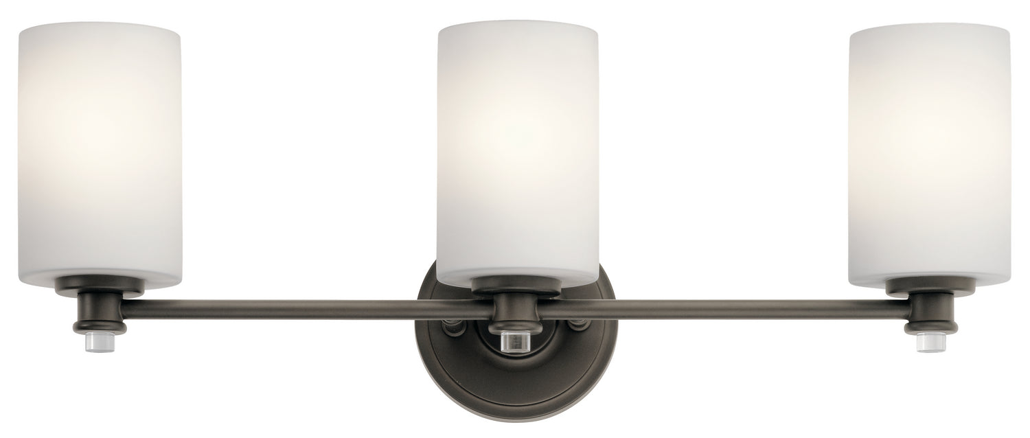 KICHLER 45923OZ Joelson 24" 3 Light Vanity Light With Satin Etched Cased Opal And Clear Glass Accent Glass In Olde Bronze
