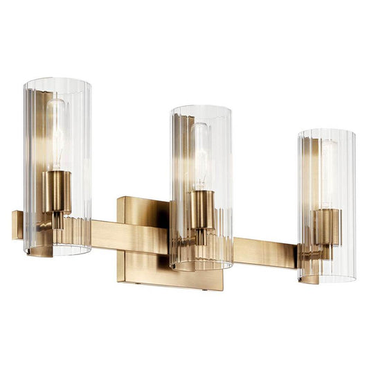 KICHLER 55168CPZ Jemsa 22.75 Inch 3 Light Vanity with Clear Fluted Glass in Champagne Bronze