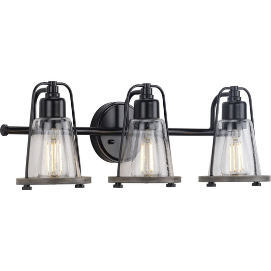PROGRESS LIGHTING P300297-031 Matte Black Conway Collection Three-Light Matte Black and Clear Seeded Farmhouse Style Bath Vanity Wall Light