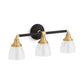 KOHLER K-10572-BML Devonshire Three-Light Sconce In Black with Brass Trim