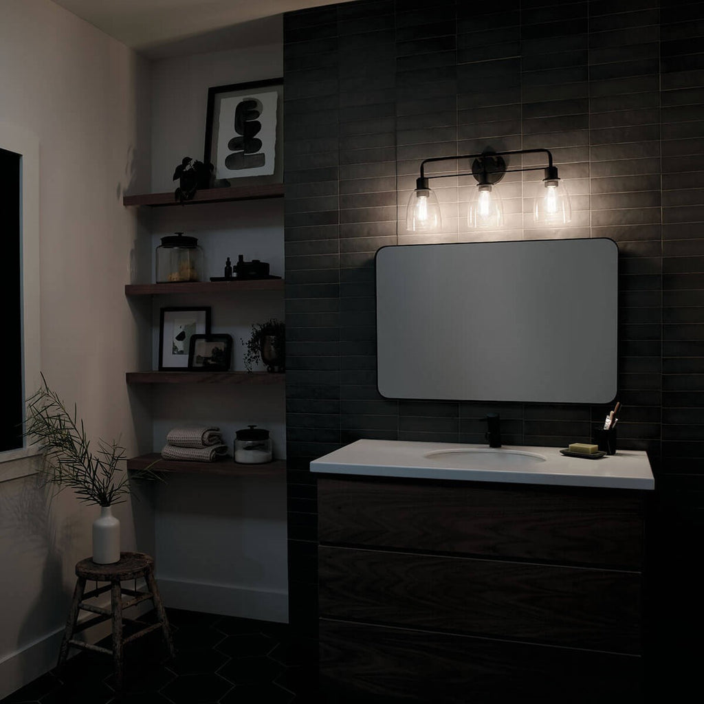 KICHLER 55102BK Meller 24" 3 Light Vanity Light With Clear Glass Black