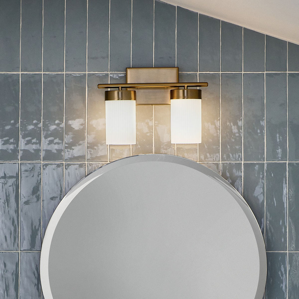 KICHLER 55111BNB Ciona 14.5" 2 Light Vanity Lighte With Round Ribbed Glass Brushed Natural Brass