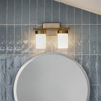 KICHLER 55111BNB Ciona 14.5" 2 Light Vanity Lighte With Round Ribbed Glass Brushed Natural Brass