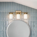 KICHLER 55112BNB Ciona 24" 3 Light Vanity Lighte With Round Ribbed Glass Brushed Natural Brass