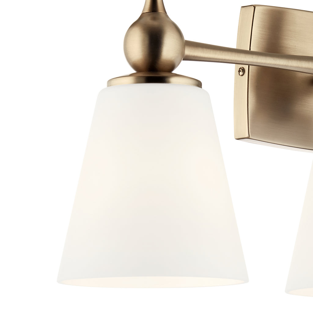 KICHLER 55092CPZ Cosabella 24" 3 Light Vanity Light With Etched White Glass Champagne Bronze