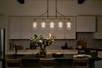 KICHLER 52379NBR Everett 42 Inch 5 Light Linear Chandelier with Clear Glass in Polished Nickel