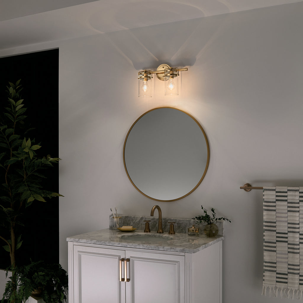KICHLER 45688CPZ Brinley 15.75" 2 Light Vanity Light With Clear Glass In Champagne Bronze