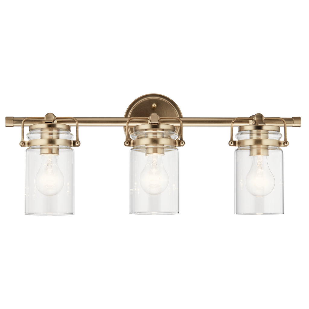 KICHLER 45689CPZ Brinley 24" 3 Light Vanity Light With Clear Glass In Champagne Bronze