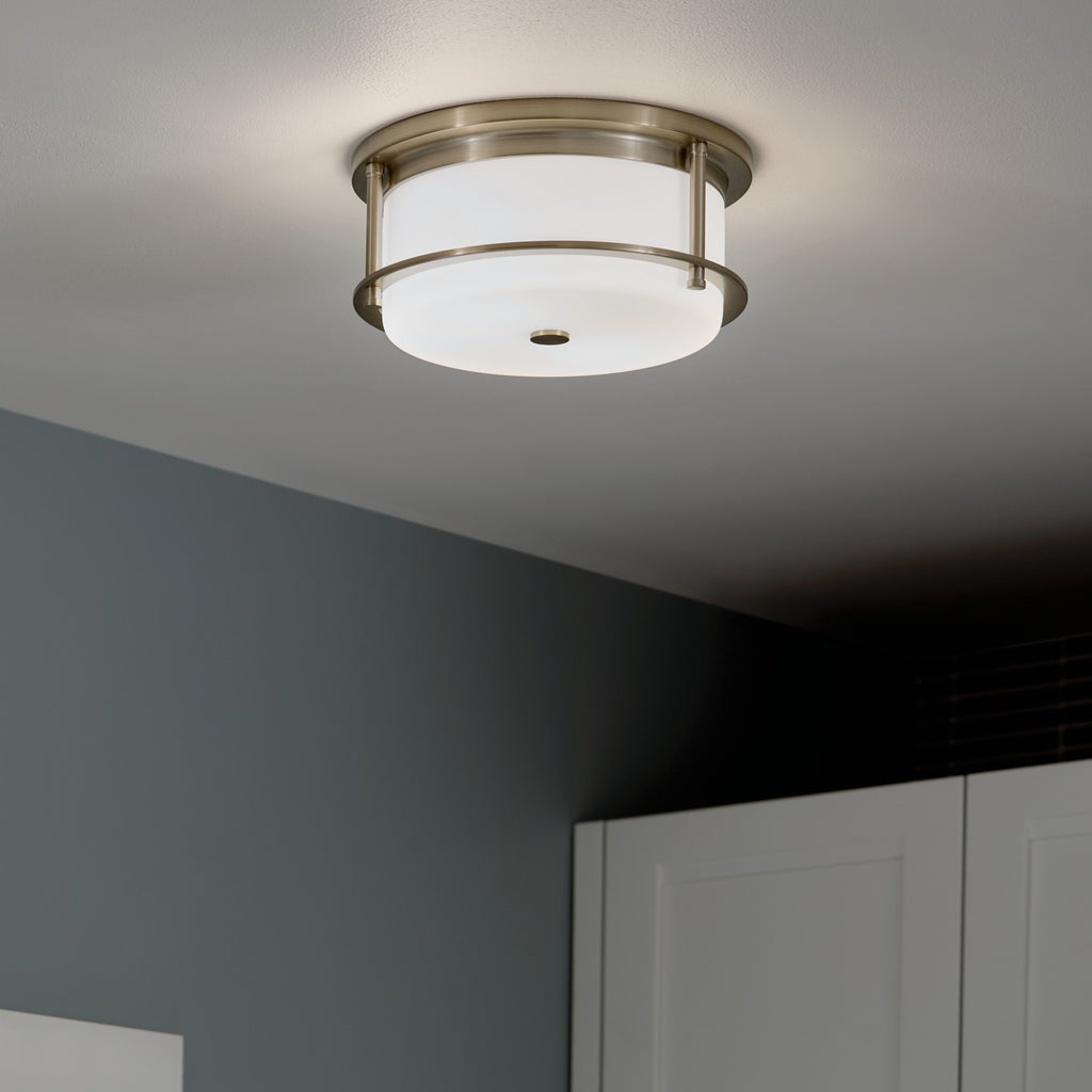 KICHLER 52595CPZ Brit 12 Inch 2 Light Flush Mount With Satin Etched Cased Opal Glass In Champagne Bronze