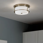 KICHLER 52595CPZ Brit 12 Inch 2 Light Flush Mount With Satin Etched Cased Opal Glass In Champagne Bronze