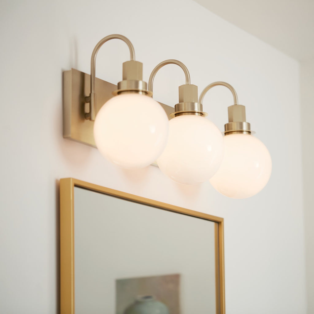 KICHLER 55151CPZ Hex 22.75 Inch 3 Light Vanity With Opal Glass In Champagne Bronze