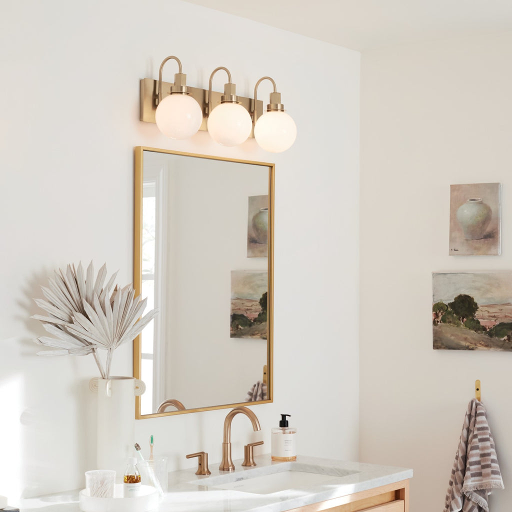 KICHLER 55151CPZ Hex 22.75 Inch 3 Light Vanity With Opal Glass In Champagne Bronze