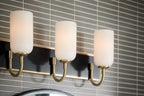 KICHLER 55163CPZ Solia 24 Inch 3 Light Vanity With Opal Glass In Champagne Bronze With Black
