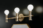 KICHLER 55157CPZ Torche 24.25 Inch 3 Light Vanity In Champagne Bronze