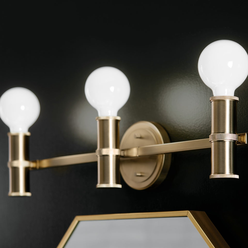KICHLER 55157CPZ Torche 24.25 Inch 3 Light Vanity In Champagne Bronze