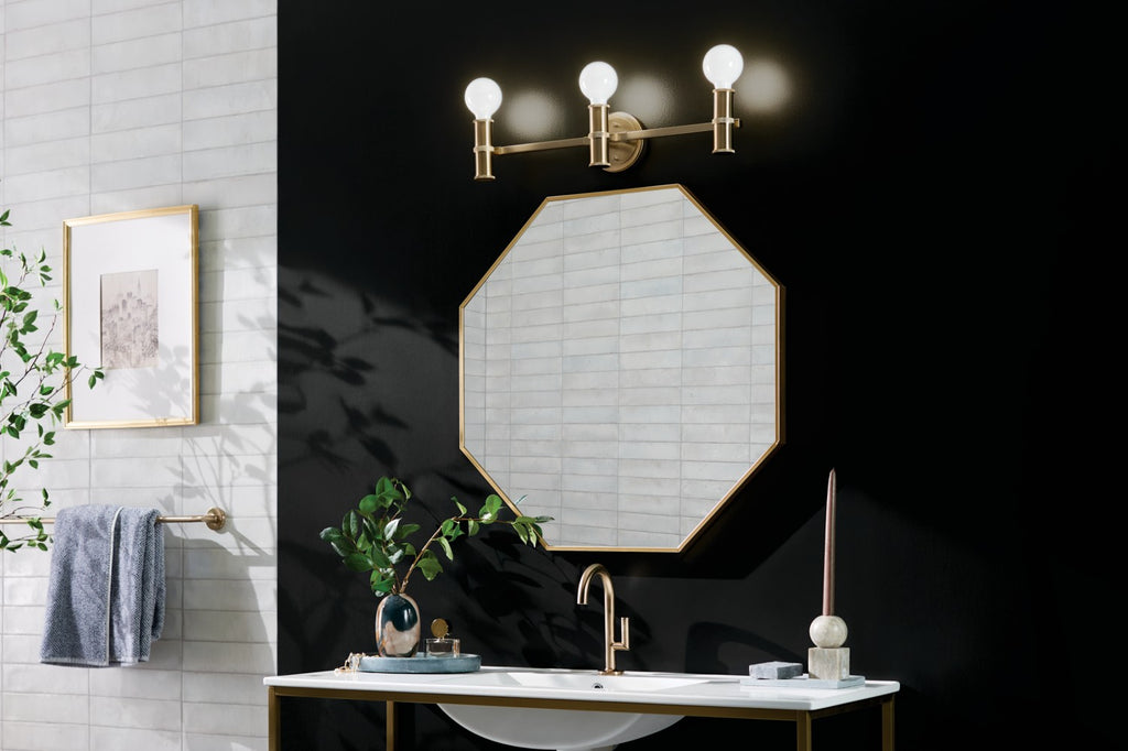 KICHLER 55157CPZ Torche 24.25 Inch 3 Light Vanity In Champagne Bronze