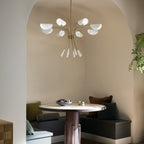 KICHLER 52560CPZWH Arcus 45.5 Inch 8 Light Chandelier In Champagne Bronze With White