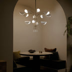 KICHLER 52561CPZWH Arcus 46.25 Inch 12 Light Chandelier In Champagne Bronze With White