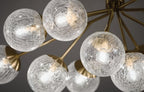 KICHLER 52703CPZ Silvarious 48 Inch 12 Light Linear Convertible Chandelier With Clear Crackled Glass In Champagne Bronze