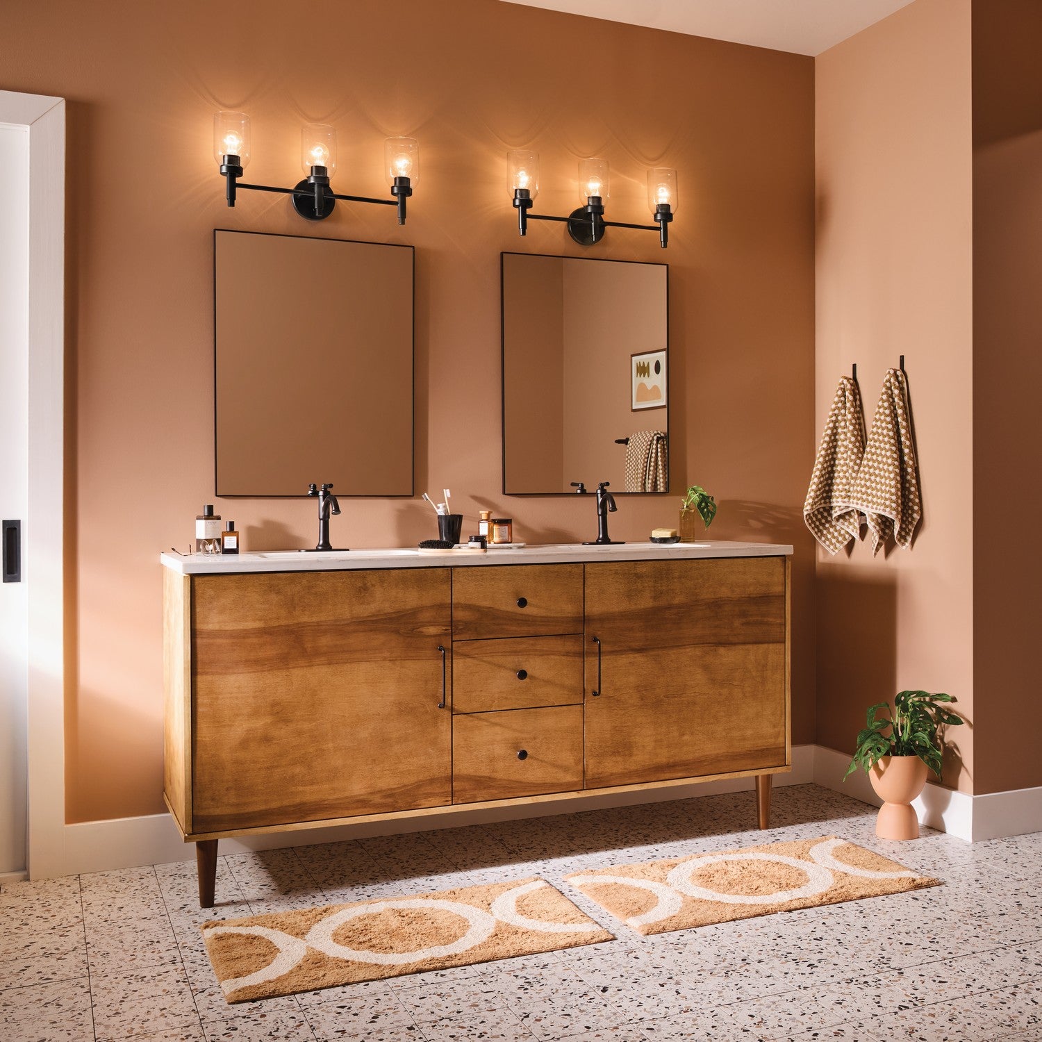 KICHLER 55185BK Madden 24 Inch 3 Light Vanity With Clear Glass In Black