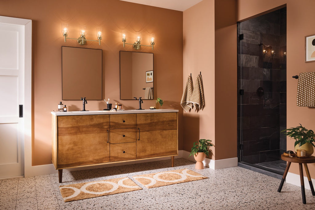 KICHLER 55185CPZ Madden 24 Inch 3 Light Vanity With Clear Glass In Champagne Bronze