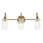 KICHLER 55211CPZ Kavi 23" 3-Light Vanity Light With Clear Glass In Champagne Bronze