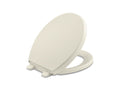 KOHLER K-25302-96 Reveal Quiet-Close Round-Front Toilet Seat In Biscuit